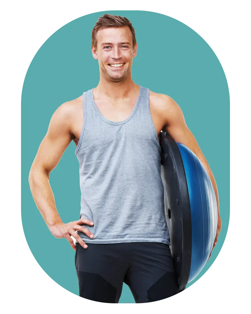 Man holding a Pilates half ball - Totum Life Science